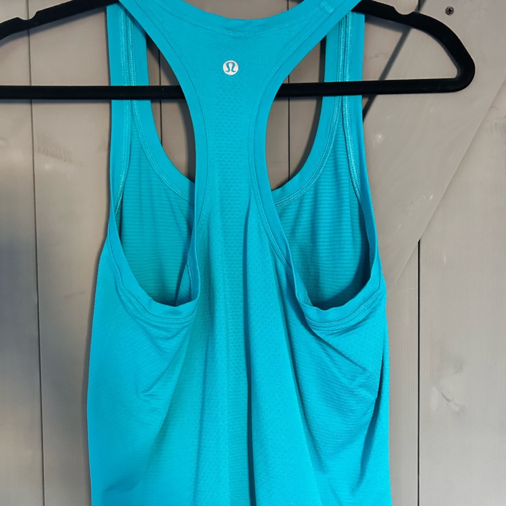 Two Lululemon Workout Tops.